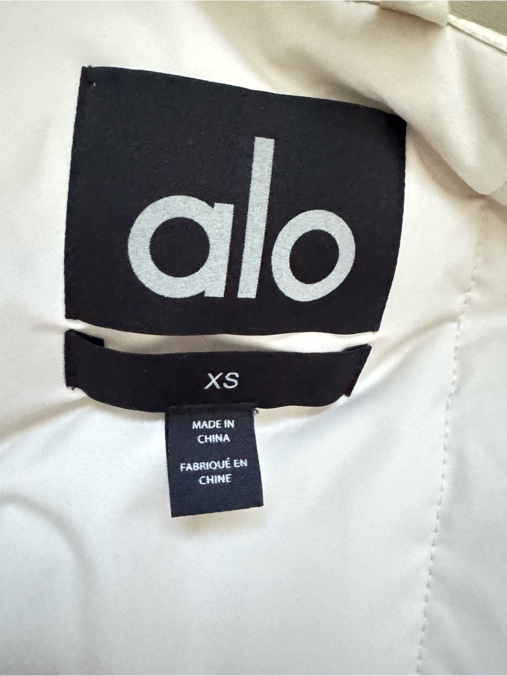 ALO Yoga Cream Faux-Leather Bomber Jacket - Picture 3 of 11